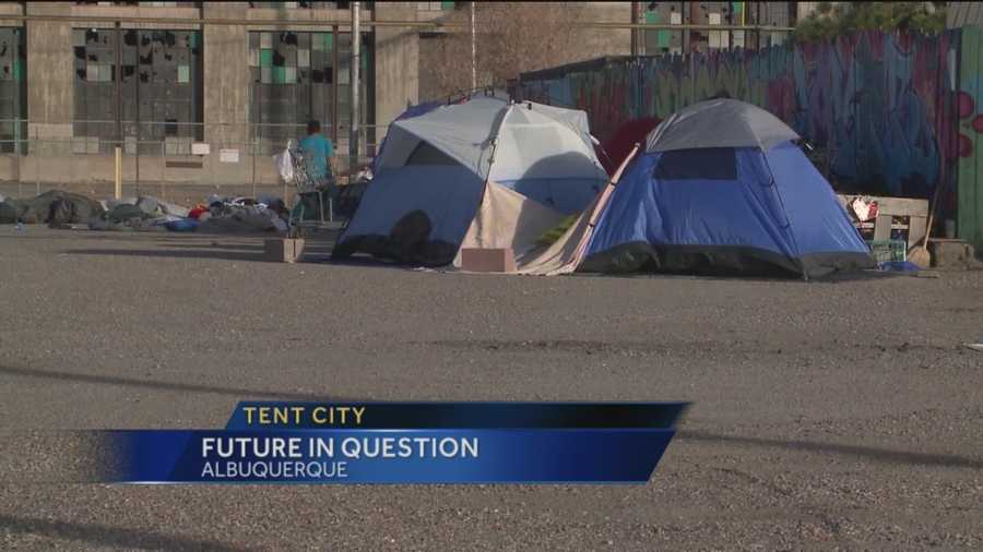 A neighborhood group invited homeless campers to stay on a lot they didn't own, but it's not up to the city to get them out of there.