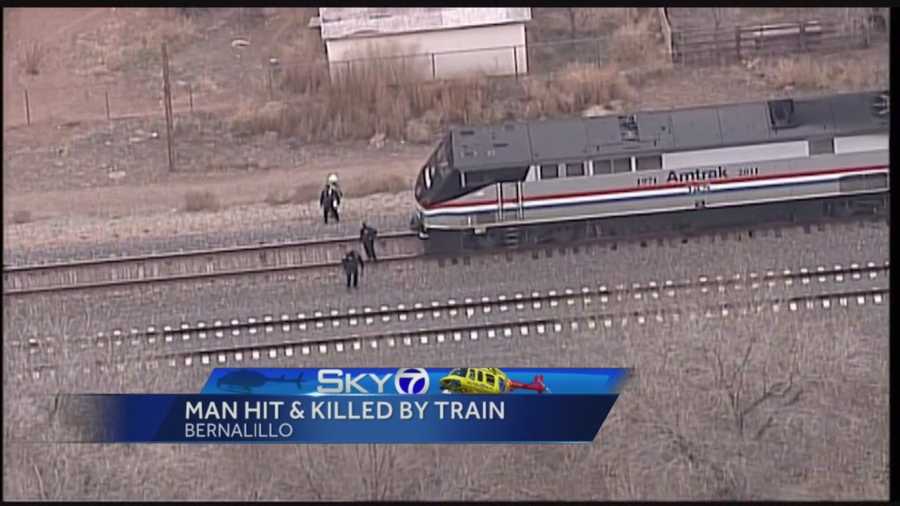Officials said the man hit and killed by an Amtrack train in Bernalillo was lying on the tracks.
