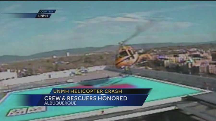 A helicopter spun out of control and landed on top of UNMH last April. The mayor recently honored those that kept the crash from becoming deadly.