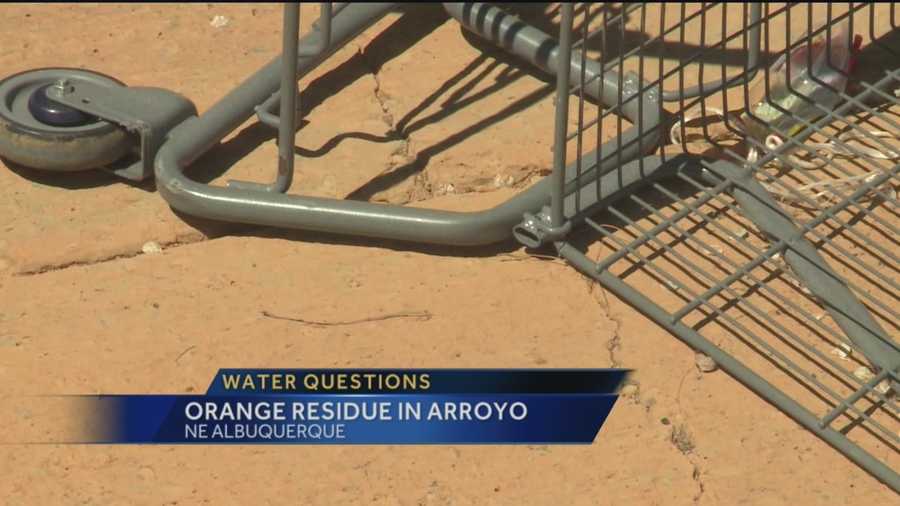 An orange residue found in an Albuquerque arroyo generated a lot of talk Monday.