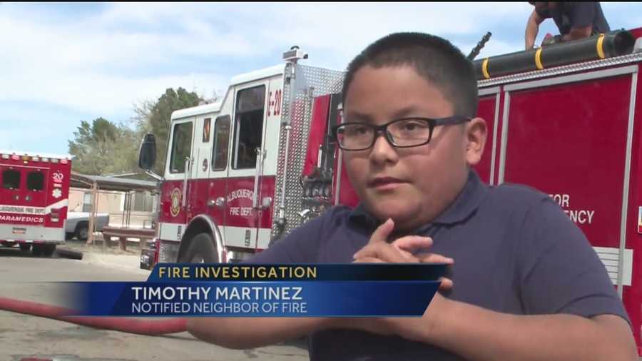 A 9-year-old boy is being called a hero after he helped an elderly woman out of her home during a fire.