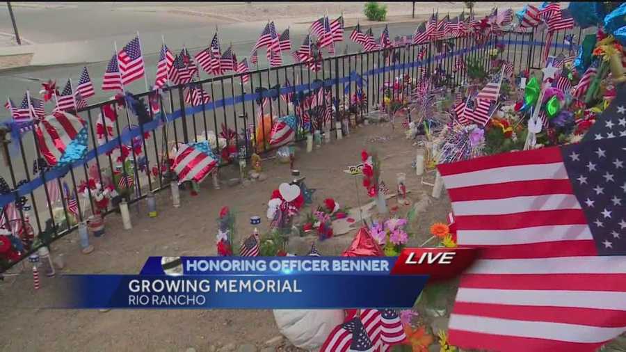 Rio Rancho officials are starting to sort through hundreds of items left at Officer Gregg Benner's memorial.