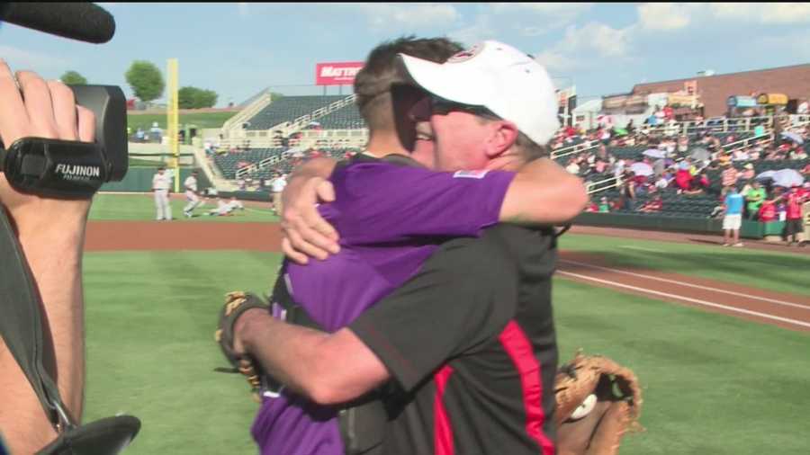An Albuquerque father said he got the best surprise of his life Sunday after throwing out the first pitch at the Albuquerque Isotopes game.