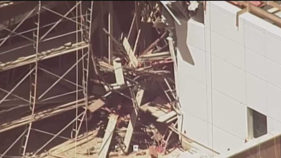 Two investigators from OSHA combed through debris Wednesday, at the scene of a fatal hospital construction accident in Rio Rancho.