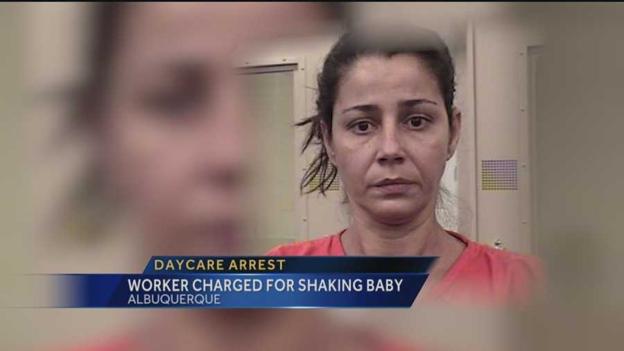A daycare worker seen in a video violently rocking a baby is in jail Tuesday.