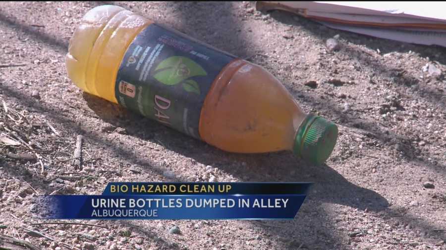 Hazmat crews spent Thursday cleaning an Albuquerque alley after someone dumped a pile of plastic bottles full of urine there.