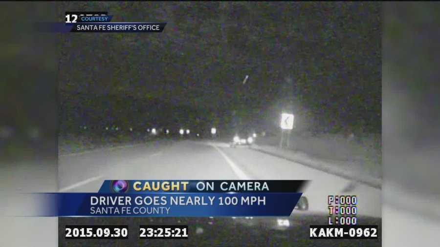 Santa Fe Sheriff's dash cam video captures deputies in hot pursuit of a black car last month.