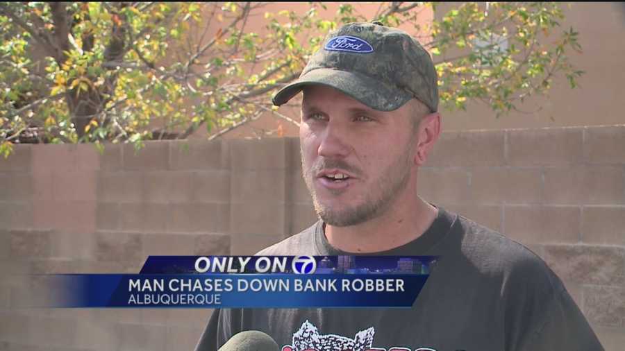 A man suspected of robbing an Albuquerque bank is now in FBI custody thanks to a good Samaritan who chased him on foot until police could intervene.