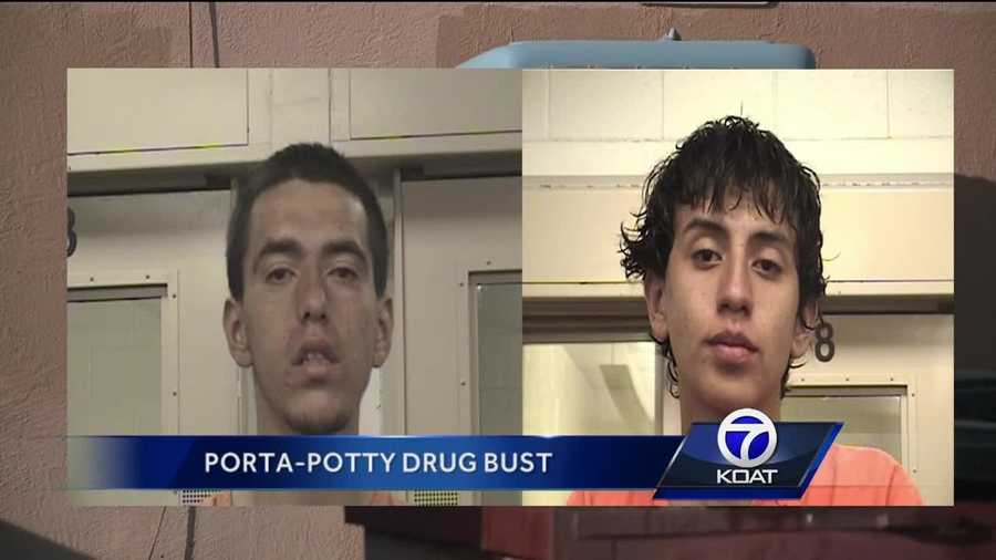 Two area men are accused of dealing drugs out of a portable toilet in the parking lot of an adult video store.