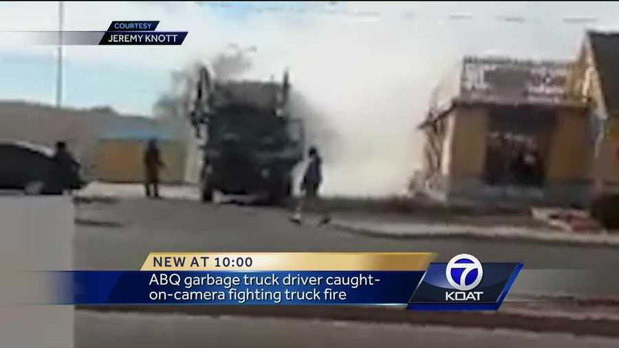 ABQ garbage truck driver caught-on-camera fighting truck fire.