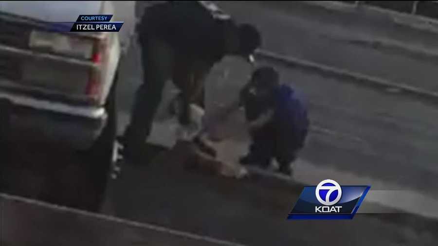 Men caught on camera cutting tail off roadkill