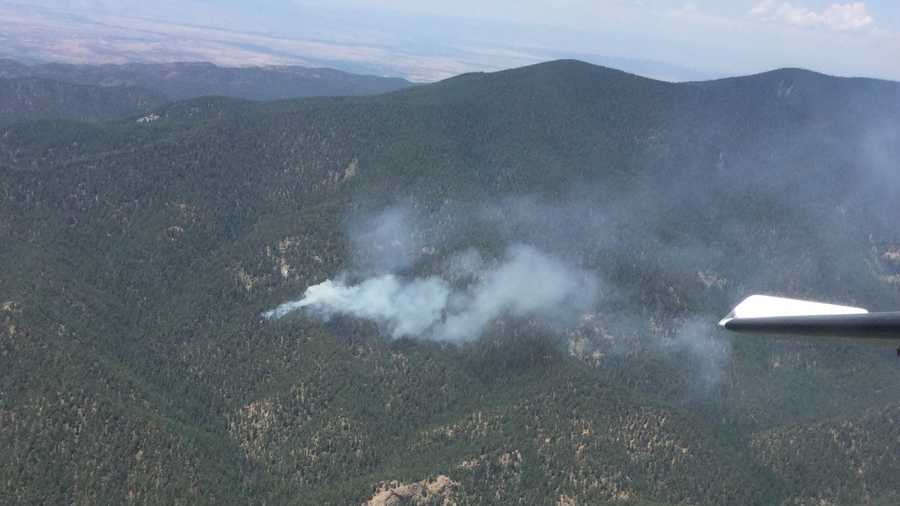Fire officials are battling a fire in the Wilderness portion of the Santa Fe Municipal Watershed.