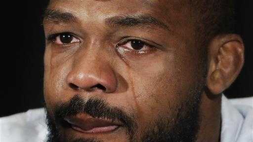 Mixed martial arts fighter Jon Jones cries as he speaks during a news conference, Thursday, July 7, 2016, in Las Vegas. Jones was scheduled to fight Daniel Cormier at UFC 200 but was pulled from the event because of a potential violation of the UFC's anti-doping policy.