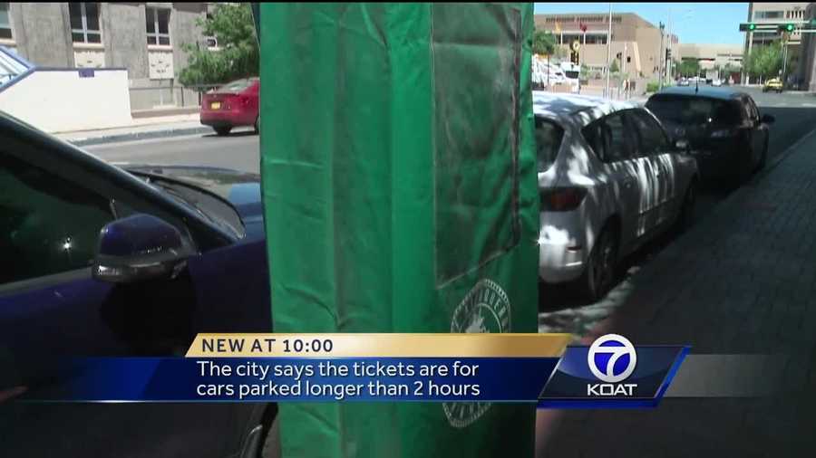 Drivers in downtown ABQ got tickets after finding the parking meter covered.