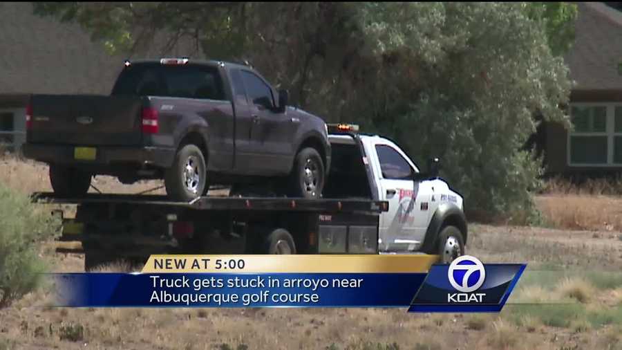 A woman caught the attention of some curious golfers after Albuquerque Police helped tow out her truck that got stuck in an arroyo near the golf course. The woman told officers she got stuck while driving around trying to catch Pokemon using her "Pokemon Go" app.