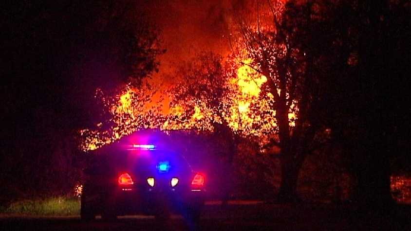 Firefighters are investigating huge flames that scorched a northeast Oklahoma City home Monday morning.