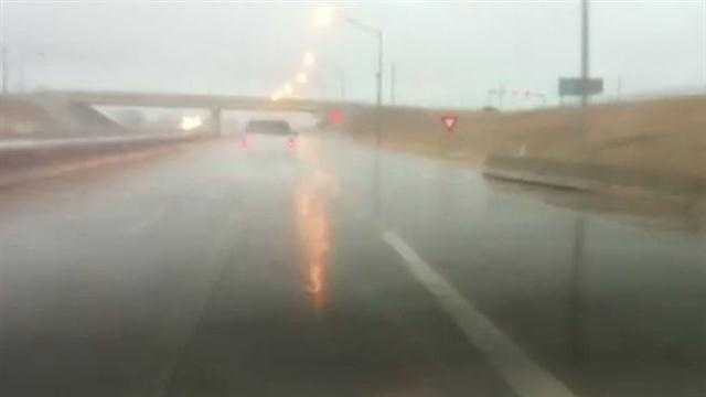 The rain was pouring down on the Kilpatrick Turnpike, near Broadway Extension, Tuesday morning.