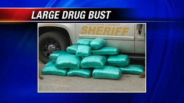 The Canadian County Sheriff's Office said it has seized more than 230 pounds of marijuana. Deputies arrested Nathan Bond and Carmelita Ousley after they made the Saturday morning stop near Banner Road and Interstate 40.
