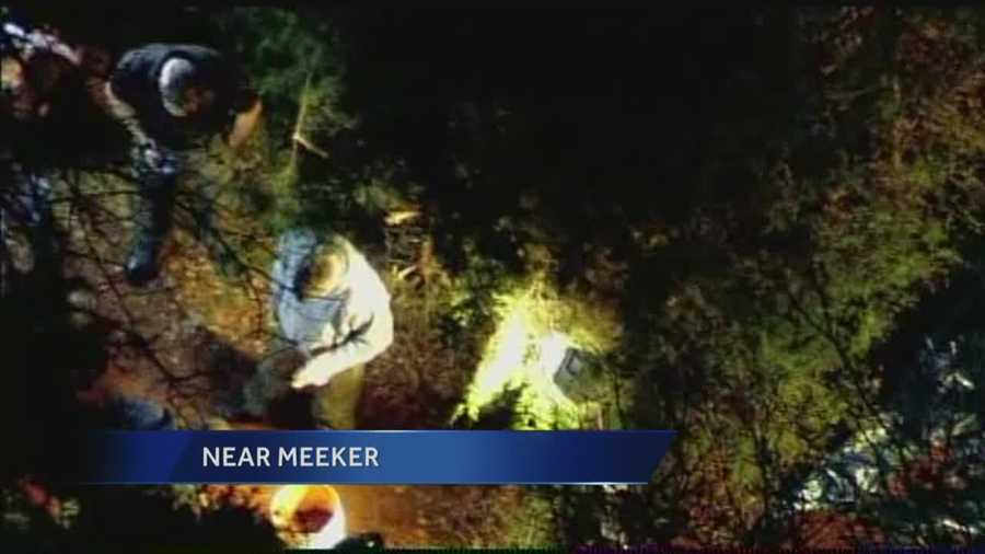 Multiple law enforcement agencies are investigating the discovery of a body Wednesday in a grave near Meeker.