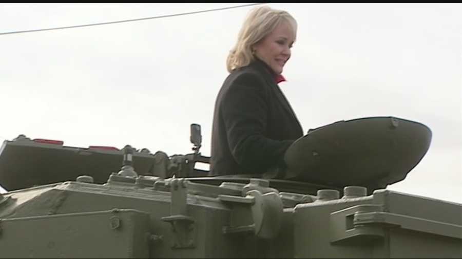 Gov. Mary Fallin rode in a tank and shot a gun at the grand opening of the Wilshire Gun Range on Friday.