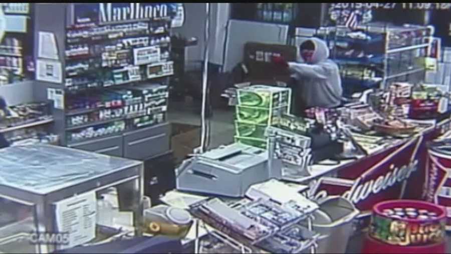 A store manager describes staring down the barrel of a gun during an armed robbery.