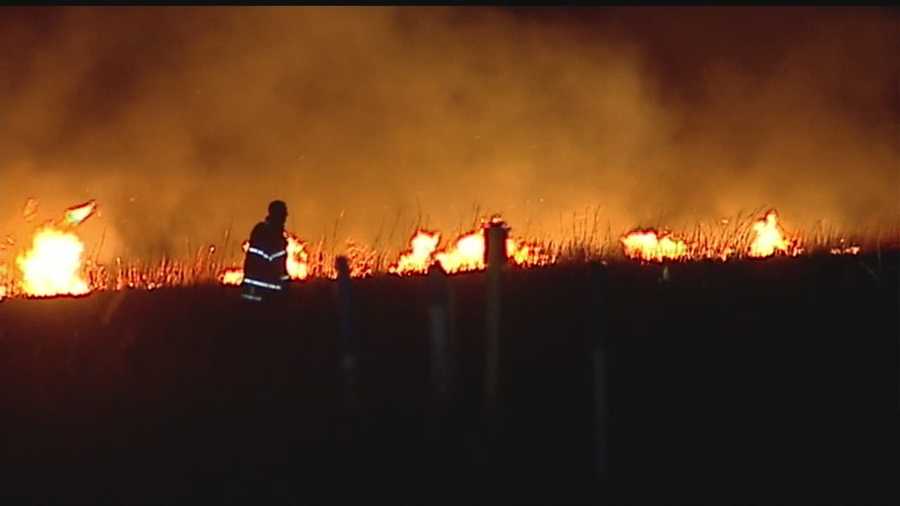 A grass fire spread quickly Sunday evening in Edmond, fueled by high winds and dry weather.