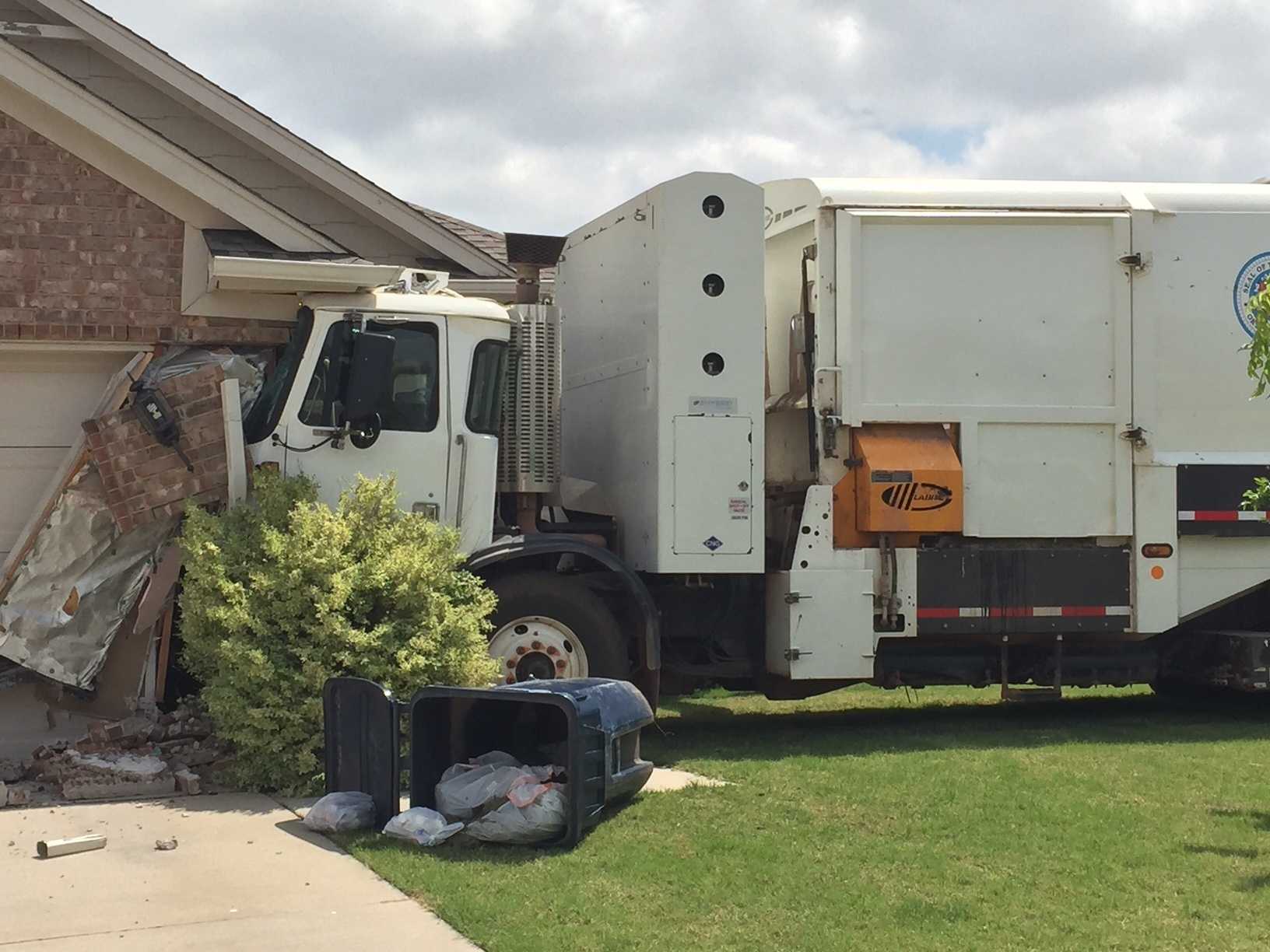 Garbage Truck Crashes Into 2 Homes In Northwest Oklahoma City