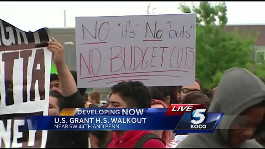 Hundreds of students at U.S. Grant High School protested the district's budget cuts with a walkout Monday morning.