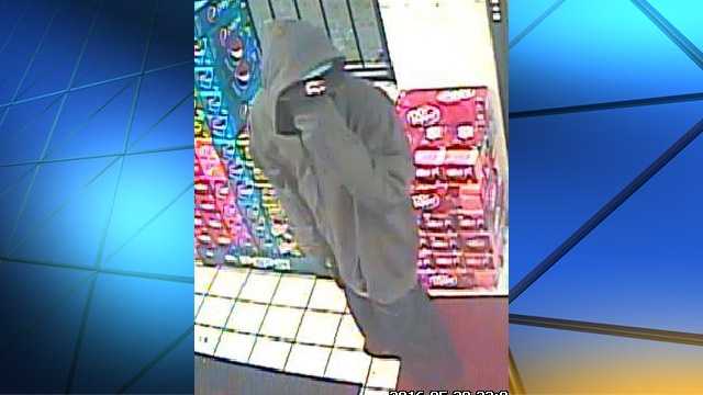 Police search for 2 men caught on camera robbing SW OKC store at gunpoint