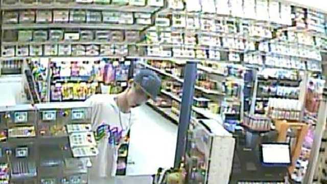 Police release pictures of man caught on camera stealing car at metro store