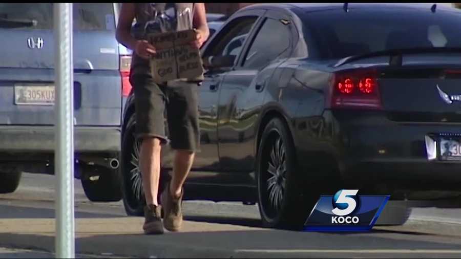 A woman was robbed at gunpoint last week by two panhandlers in southeast Oklahoma City. The woman was trying to give one of the panhandlers money when a man with a gun approached the car.