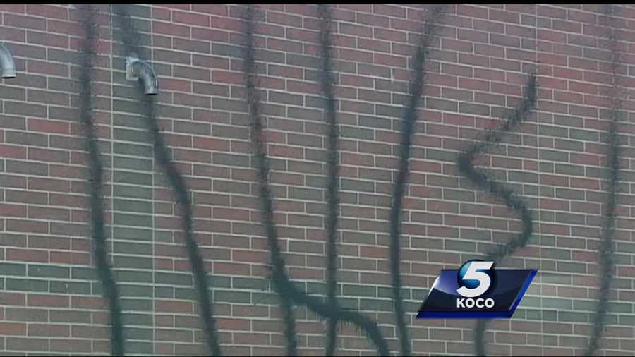 Vandals spray painted an Oklahoma City school overnight, leaving the district to clean up a mess.