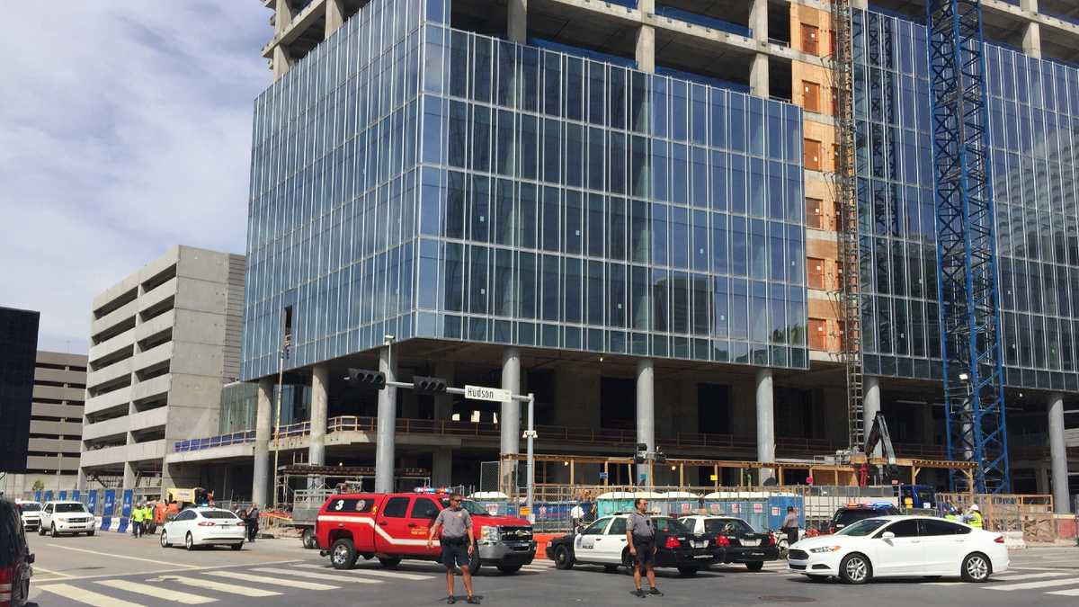 Scissor lift operator dies after driving off floor of downtown building under construction