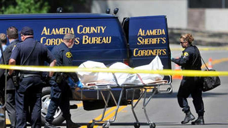 Alameda County Coroner's officials transport a body found in Pleasanton on Thursday.Photo by Doug Duran / Contra Costa Times