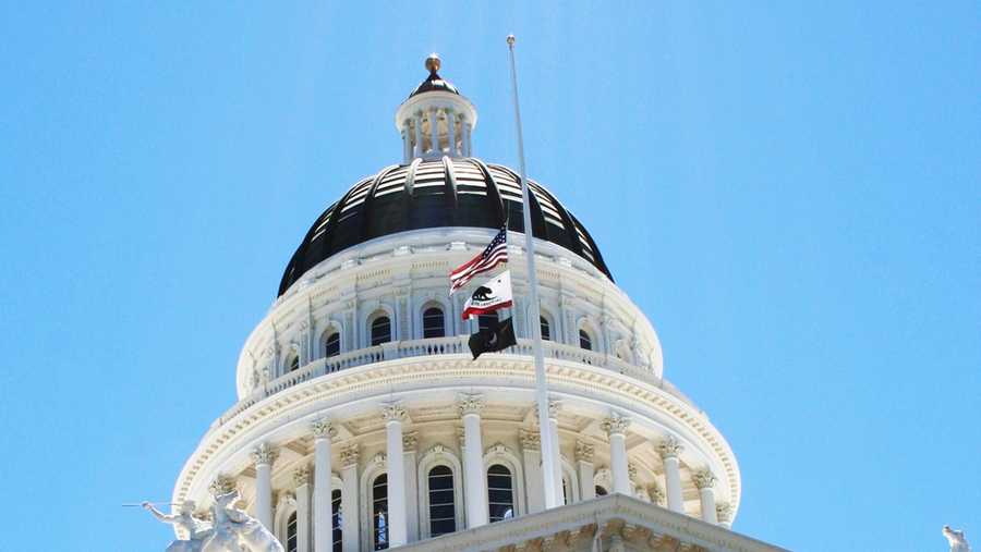 Flags at the State Capitol building are flown at half-staff in honor of Army Spc. Vilmar Galarza Hernandez. (June 6, 2012)