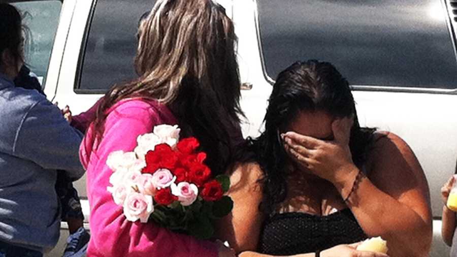 Joey Mendoza's family members are distraught the morning after the 13-year-old was slain in Santa Cruz. (Aug. 9, 2012)