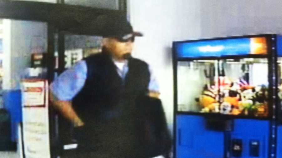 Salinas police said Richard Chacon is seen in this surveillance image robbing Walmart. 
