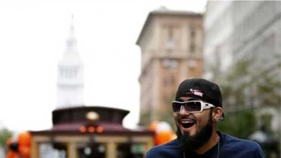 Giants pitcher Sergio Romo whipped the roaring crowd into a frenzy with his energy.