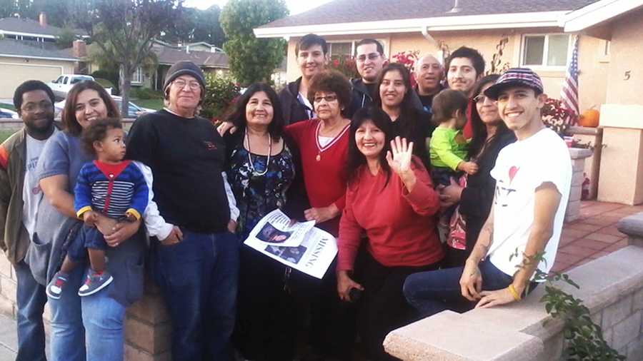 Irene Cantu, center, is seen smiling with her family on Wednesday. 