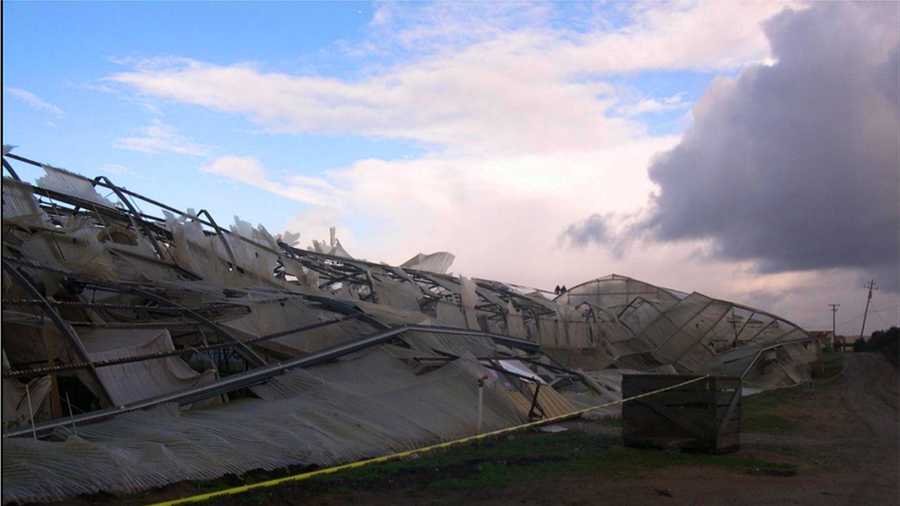 Damage from Saturday's tornado in Watsonville is seen. 