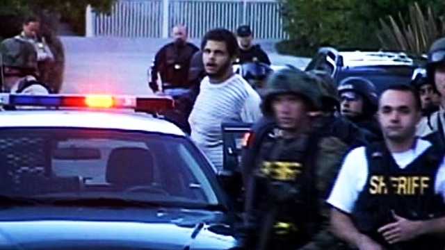 Maurice Ainsworth is seen being arrested in Santa Cruz on Nov. 29, 2010.