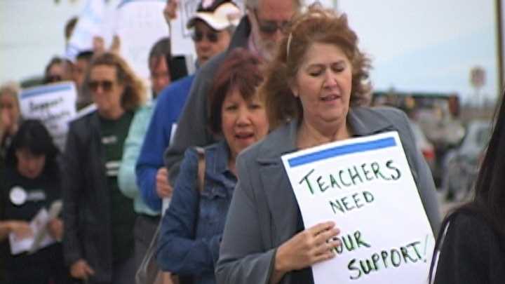 Dozens of teachers gathered to protest in front of the Alisal Union School District board meeting Wednesday night.