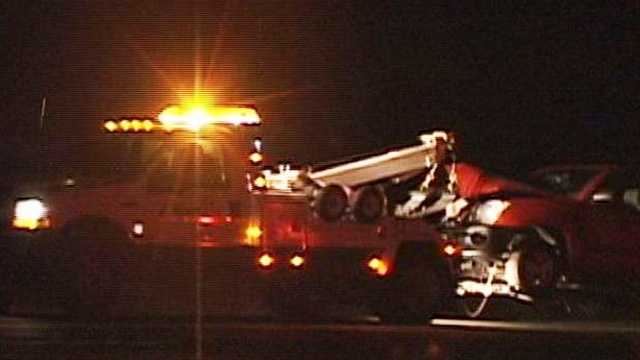 One car in the triple-fatal crash on Highway 101 in King City is towed away. (Feb. 22, 2012)