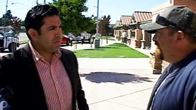 Jose Castaneda talks to Juan Sandoval. (June 20, 2013)