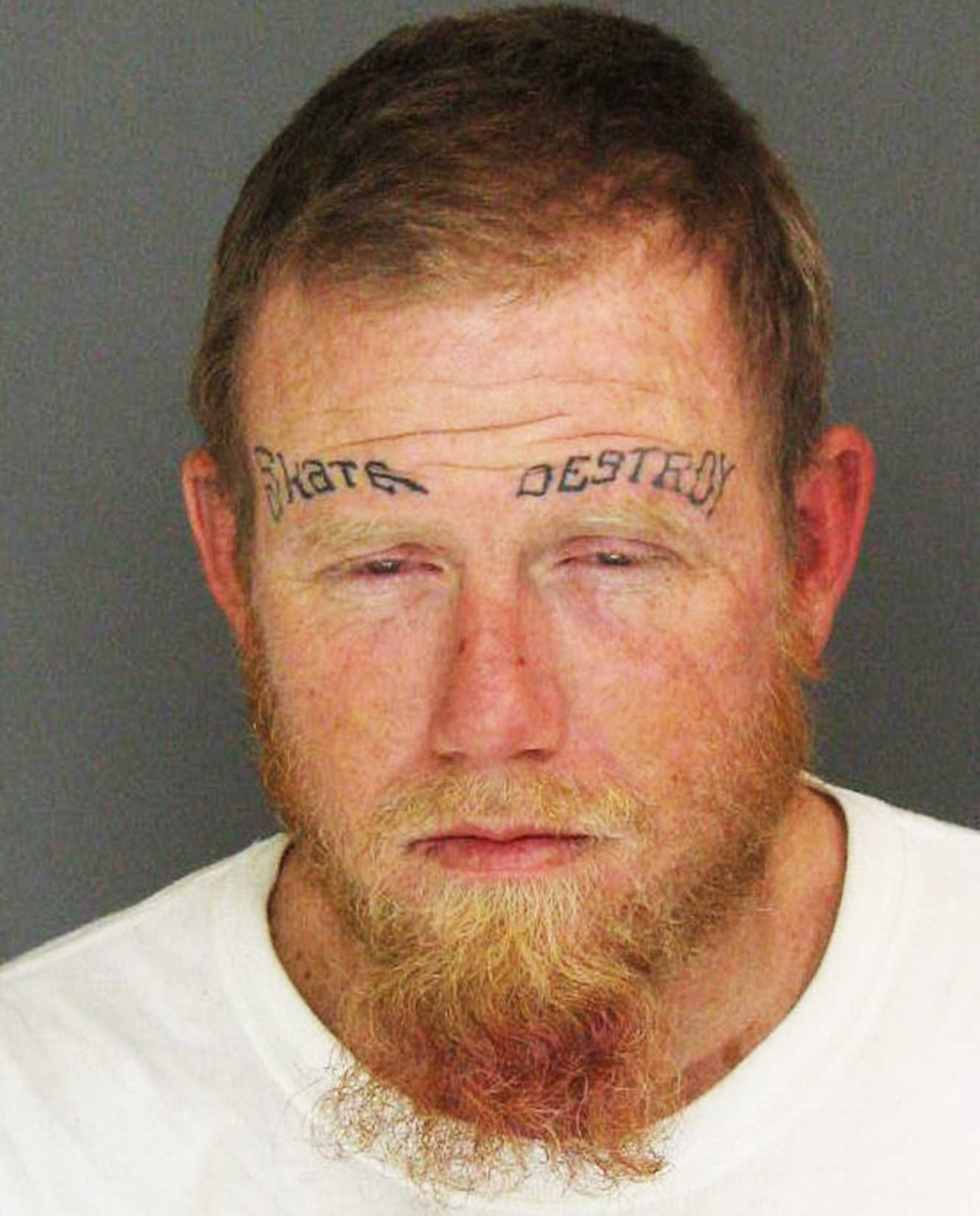 Santa Cruz inmate with skate and destroy face tattoos escapes