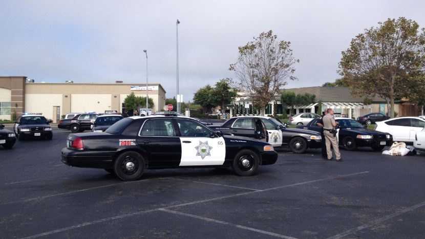 Police arrested an adult and a teen on Monday in connection with an attempted armed robbery at the Classic Coachworks automobile repair shop in Monterey.