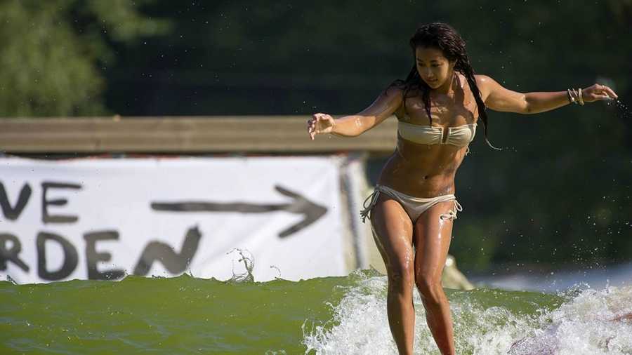Kelia Moniz, an ASP World Longboard Champion and Roxy model, catches a wave at Wavegarden.