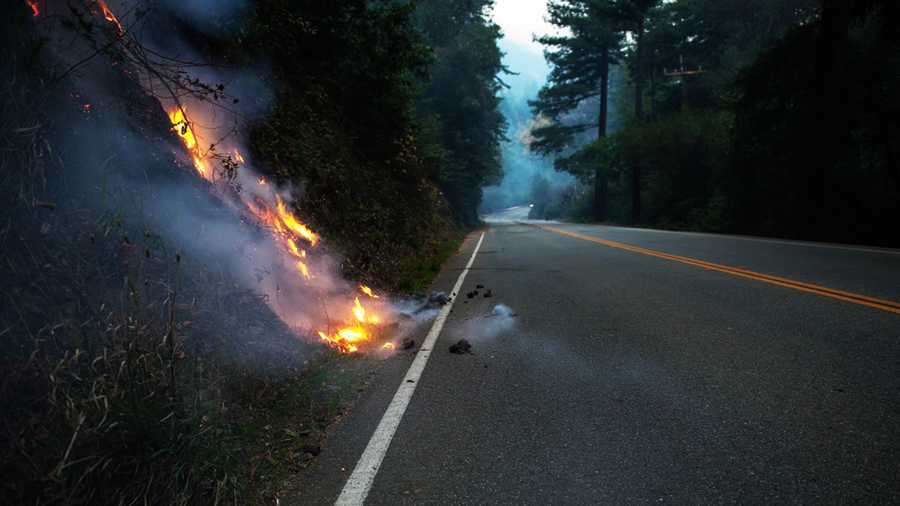 Fire embers fall onto Highway 1 in Big Sur.  /  Photo by George Krieger