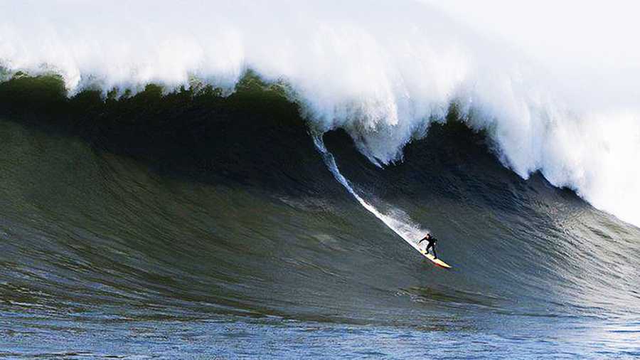 Shawn Dollar of Santa Cruz catches a 55-foot wave at Mavericks. 
