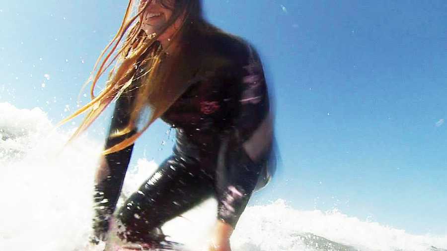 Autumn Fry catches a wave in Santa Cruz with a GoPro on her surfboard. 